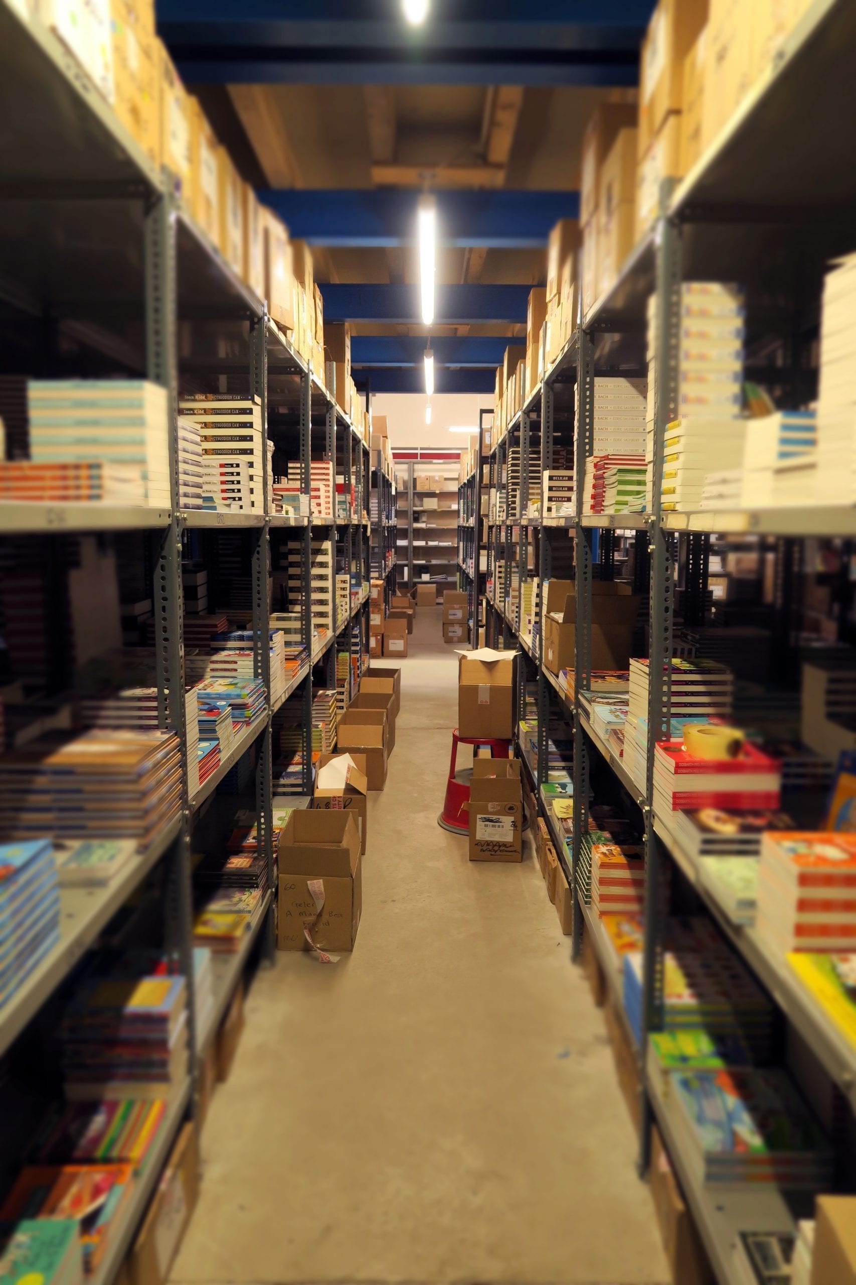 The shelves of our Distribution Centre are stacked high with books