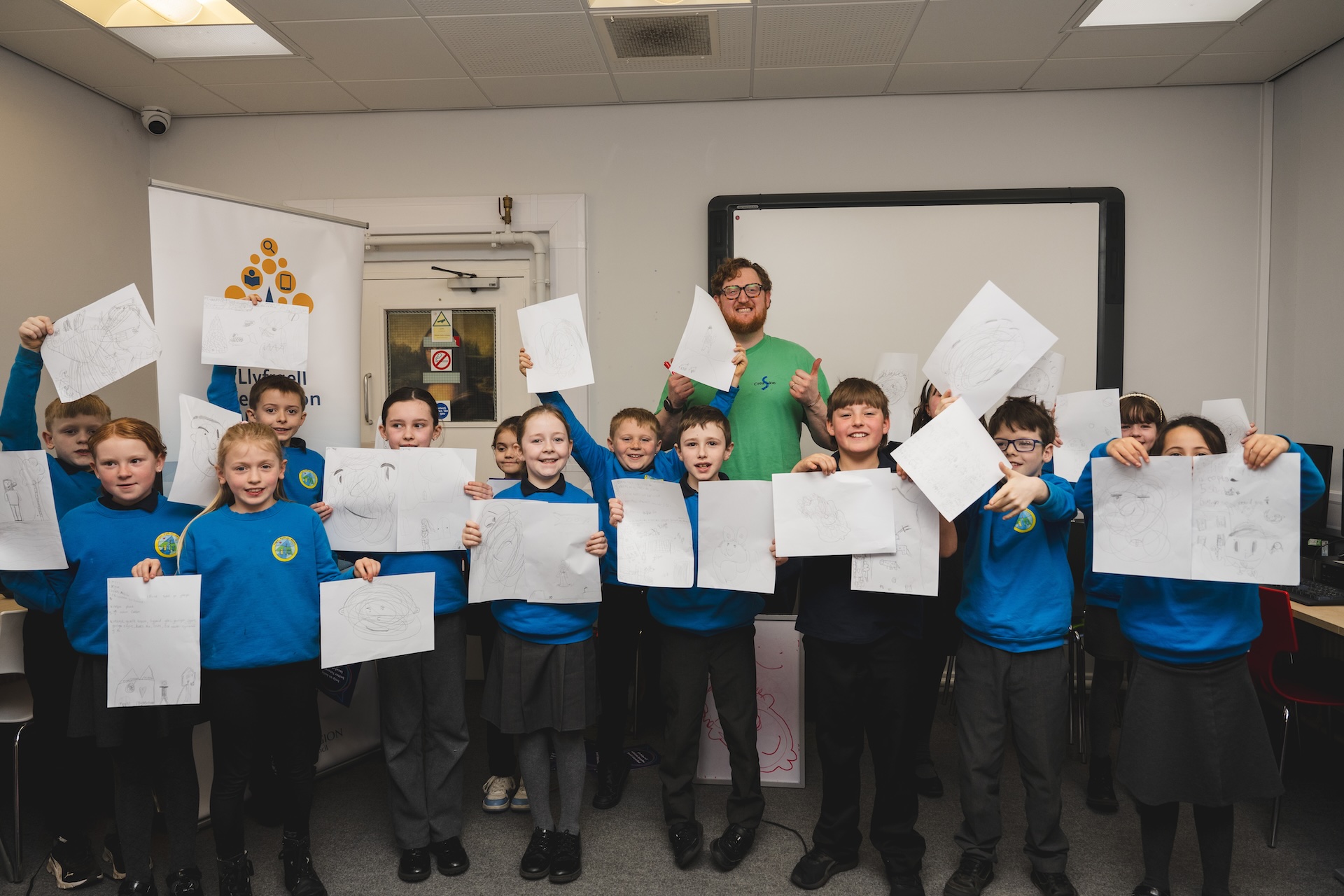 Puipls with Bardd Plant Cymru Sion Tomos Owen in